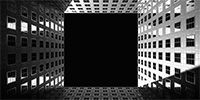 black and white art prints of a high rise building from below